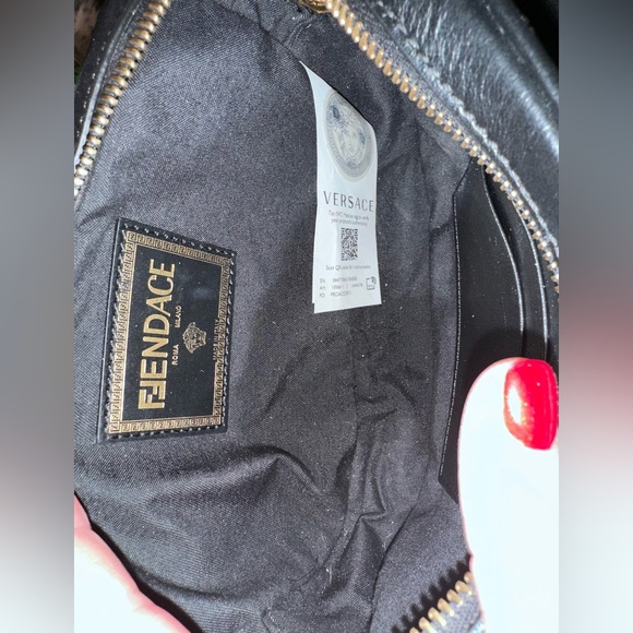 Authentic FENDACE Camera Crossbody
Fendi x Versace Collaboration | Black & Gold - Picture 13 of 14
